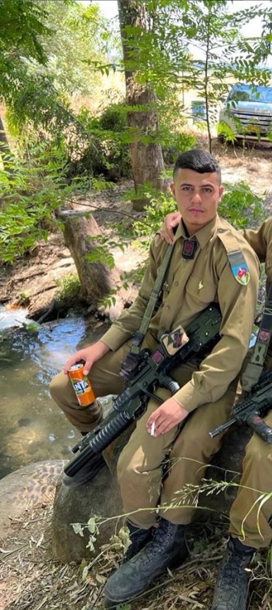 trackingisrael's tweet photo. Israeli soldier Yagel Shneour, of Belarusian origin, served in the Shaked Battalion of the Givati Brigade and posted images showing the battalion taking over a school as a military base after forcibly removing displaced Palestinians sheltering there during the genocide in Gaza. https://t.co/zflyG4QCxf