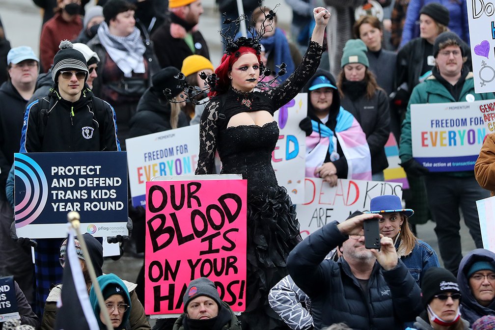 davidbloomphoto's tweet photo. Protesters rally in support of trans youth rights at the Alberta Legislature, in #yeg Saturday. On Thursday the Alberta government tabled three bills related to education, sports and health, each of them containing legislation aimed at LGBTQ+ youth. https://t.co/Qx7R7qpDYW #ABleg https://t.co/wxLFVAaiDK