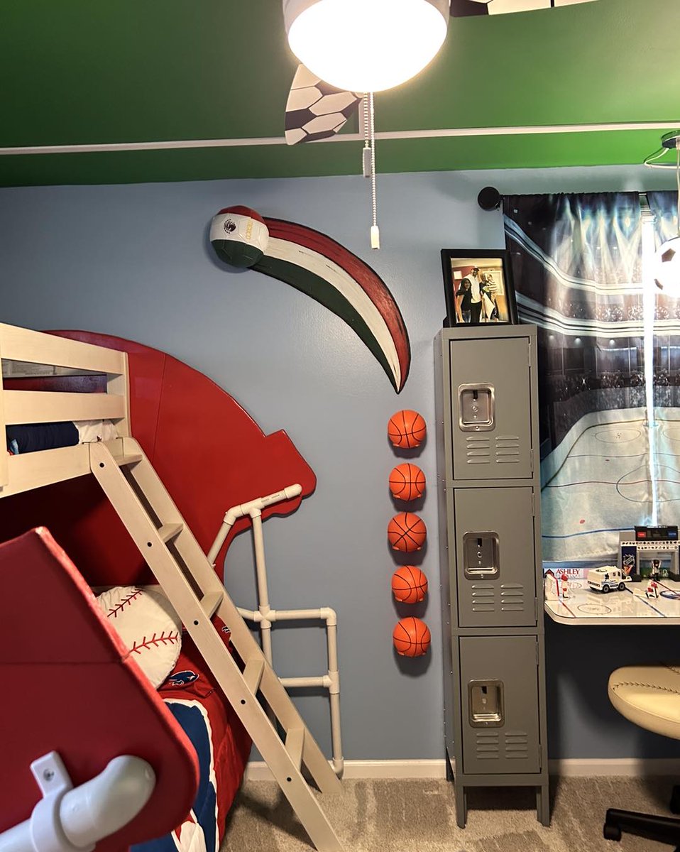 #SpecialSpaces #Buffalo knocked it out of the park with Connor’s sporty #dreambedroom!!! 🥰⚽️🏀⚾️🏈🙌🏻 He was thrilled about his fun football helmet bed, hybrid hockey desk &amp; cool ceiling. #Thankyou to the volunteers + community partners who made Connor's dreams come true. 💛🙏🏻