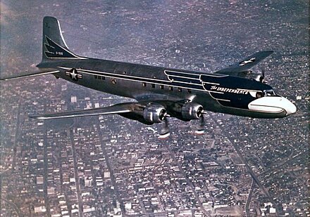 MCCCANM's tweet photo. “Air Force One” – the airplane that flies the President around – traces its roots back to 1933, when FDR was the first President to fly while in office (Teddy Roosevelt had flown in a Wright Flyer in 1910, but had already finished his terms…legend).

The first aircraft used was a Douglas “Dolphin” amphibious aircraft (meaning it can land on water or a runway), specially outfitted for luxury, w/ a separate sleeping compartment. It remained in service until 1939; when it was retired, it was not immediately replaced.

Instead, the President relied upon commercial airlines, though they were often chartered. During WWII, air travel – which didn’t have a great safety record – was still considered safer than traveling by ship, due to the German U-boat threat. 

By 1943, the military decided they needed a dedicated transport. They modified a version of the B-24, but the Secret Service was adamant the airplane was not safe; crews of the B-24 in WWII had taken to calling it the “Flying Coffin” & a “Widow Maker”; it was a difficult airplane to fly, especially at low speeds. It also was basically a bomber, which probably wasn’t the image they were looking for.

A C-54 “Sky Master” was soon refurbished & dubbed the “Sacred Cow” for use by FDR. It included a battery powered elevator to lift FDR in his wheelchair.

After FDR’s death, Truman used the “Sacred Cow” extensively; he even signed the National Security Act of 1947 aboard it, making that airplane the birthplace of the US Air Force. It’s on display at the Air Force Museum in Ohio.

Shortly after, the C-54 was replaced by a 
C-118 “Lift Master” dubbed the “Independence”. It was, of course, well-furnished; a distinctive Eagle paint scheme was put on the nose. 

In 1953, a Lockheed “Constellation” – one of the sexiest airplanes ever – entered regular service for the President w/ the moniker “Columbine II”. It became the first aircraft to carry the call sign “Air Force One” after an incident in which the normal call sign based on serial number – in this case, Air Force 8610 – entered an air traffic control area with an aircraft carrying a similar callsign (Eastern 8610…similar callsigns can cause confusion & safety hazards).

(“Air Force One” as a callsign can only be used when the President is actually aboard…in most other cases, they carry a callsign beginning with “SAM”, for Special Air Mission)

By 1959, the government recognized a need to upgrade to jets; the Soviets were using them, so it was considered undignified for the Americans to show up in a propellor driven aircraft. They adopted the Boeing 707; a few early models were used, but they were not painted in a livery associated with the United States. Some of the Lift Masters remained, though, & served as the primary transport for domestic trips.

After Kennedy took office, his wife contacted a designer for help on the layout & livery of the new 707s in 1961. The result was the distinctive blue & white paint scheme that persists to this day. It flew for quite a while, with minor interior changes from each administration.

Under Reagan, the 747 was ordered as a replacement for the 707, though the 707 would continue to serve until 1998; which airplane was used depended on the mission. The 747s began service in 1990 & have become “the” Air Force One. Replacements for the original 747s are expected in 2026; the 747 production line has been shut down for a while, but two never-used 747s were located for a retrofit; ironically, they’d been originally ordered for a Russian airline that filed for bankruptcy before delivery.

It’s a misnomer that Air Force One is always accompanied by a fighter escort; that does happen periodically, but it’s not the standard.

Pilots who want to fly AF1 apply to the 89th Airlift Wing; they are interviewed & selected. They don’t start out on AF1…they work up to it in various different platforms transporting other dignitaries. It’s a prestigious job & not easy to get. It’s a big deal for your résumé.