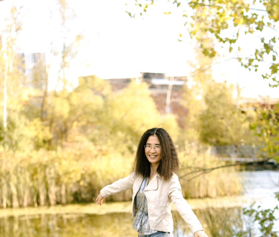 LyraRaTaygeta's tweet photo. Me🌅with no makeup. Photo taken in Oct. 2024. I seemed to have been buoyantly intoxicated by the warm, soothing, and energetic golden color (with a little dab of green) of the trees in the background. Some tree leaves there were ablaze with shades of the vivid orange and red🍁colors already, but not in this photo.