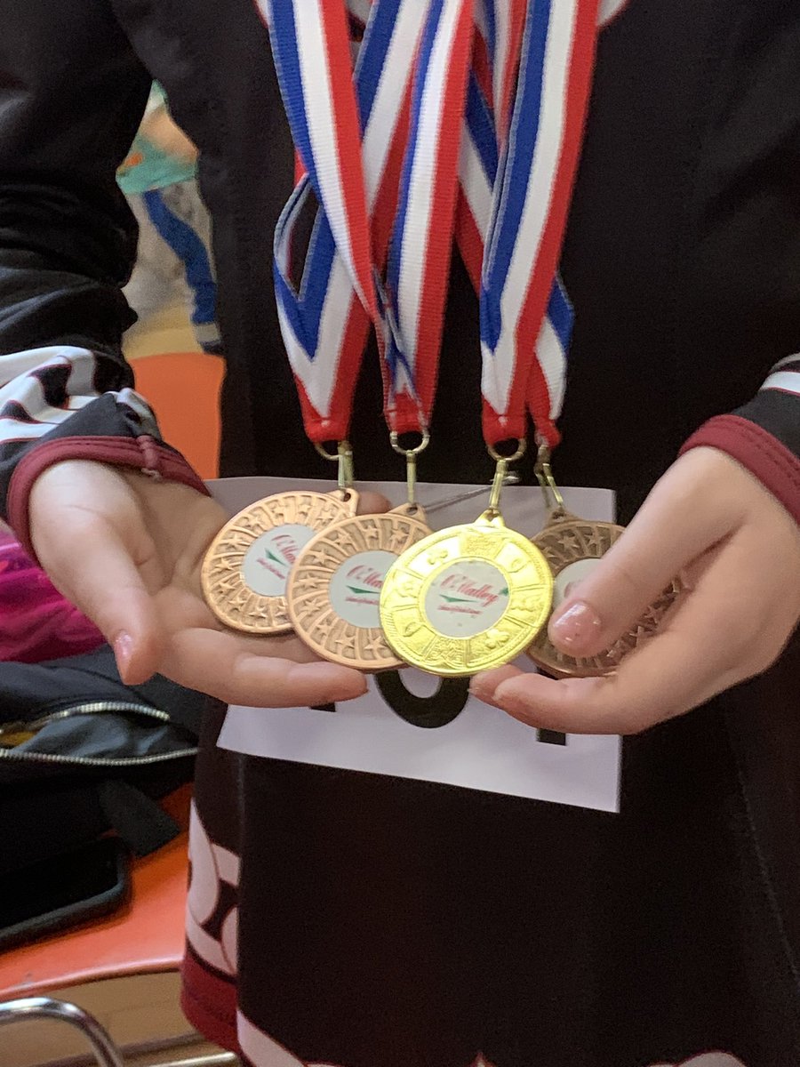 CaritasCharles's tweet photo. Very proud dad, my daughters medals at her very first #IrishDancing #Feis (competition) https://t.co/qEqXXI8jRv