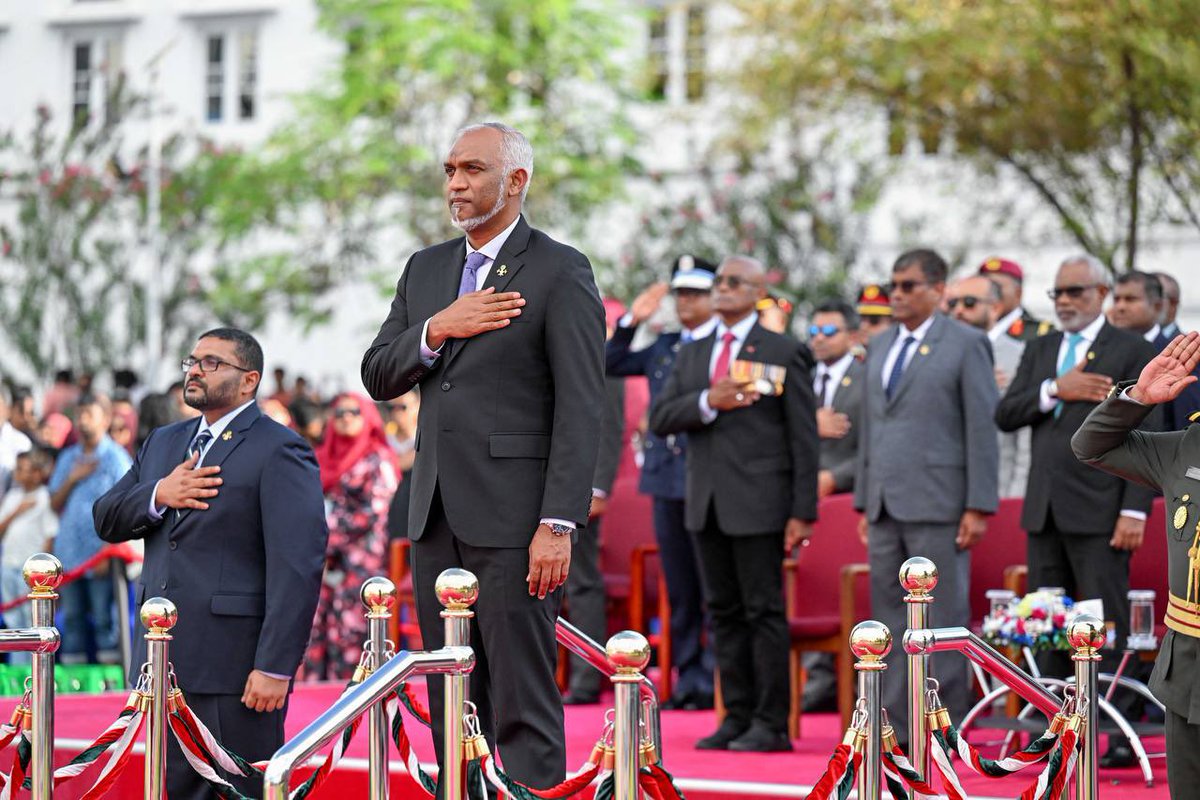 presidencymv's tweet photo. President Dr @MMuizzu and First Lady Madam Sajidha Mohamed attend the military display held by @MNDF_Official at Republic Square to commemorate Victory Day. The event showcased vessels and weaponry from the MNDF's arsenal. https://t.co/TicBDwydd2