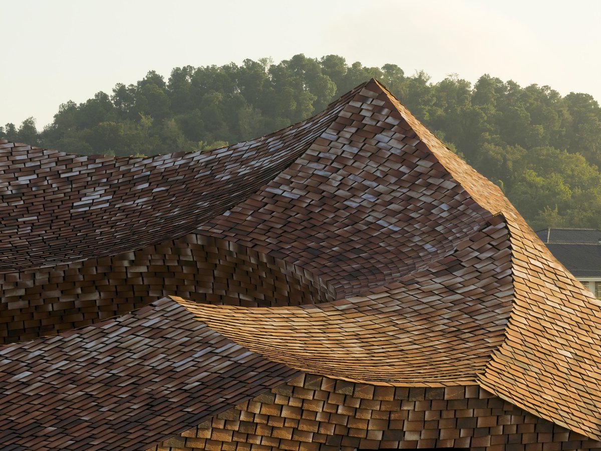 w_emerg's tweet photo. How can architecture embody the spirit of a place through materiality?
The UCCA Clay Museum, designed by Kengo Kuma &amp; Associates, responds to this question by celebrating Yixing’s legacy as China’s “ceramic capital.” 
#UCCAClayMuseum #WoodenLatticeStructure #CeramicCapital #Loca https://t.co/Wd7qnOS3rt
