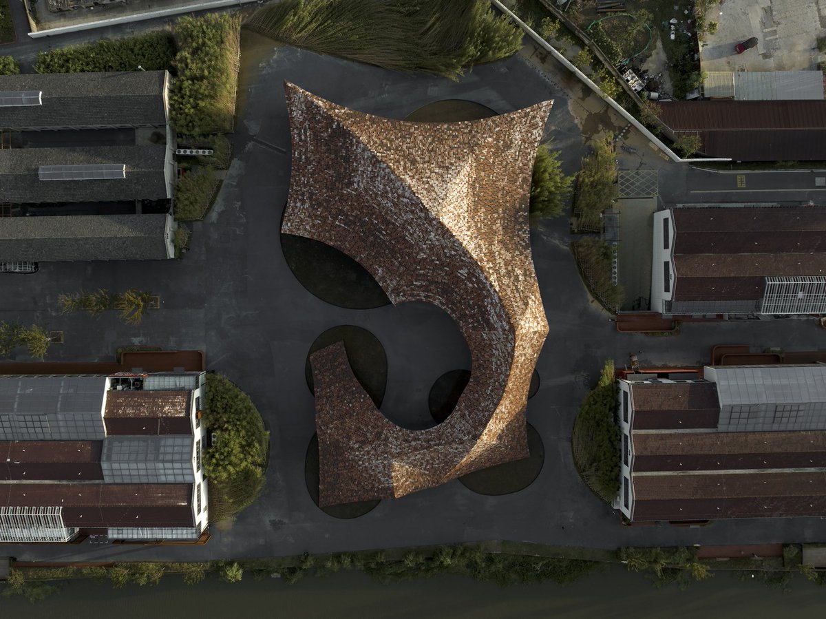 w_emerg's tweet photo. How can architecture embody the spirit of a place through materiality?
The UCCA Clay Museum, designed by Kengo Kuma &amp; Associates, responds to this question by celebrating Yixing’s legacy as China’s “ceramic capital.” 
#UCCAClayMuseum #WoodenLatticeStructure #CeramicCapital #Loca https://t.co/Wd7qnOS3rt