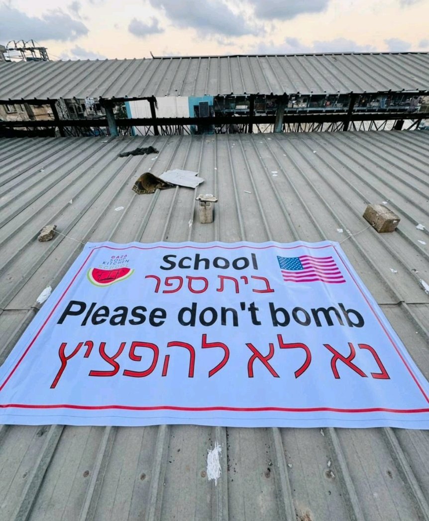 An American-Palestinian funded a temporary school in a warehouse in North Gaza. They put this sign on the roof but today Israel bombed the building