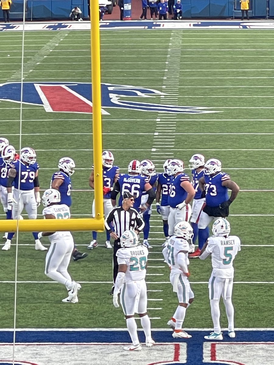 The umpire (#124) is wearing sunglasses and it is not sunny out. What are we doing?