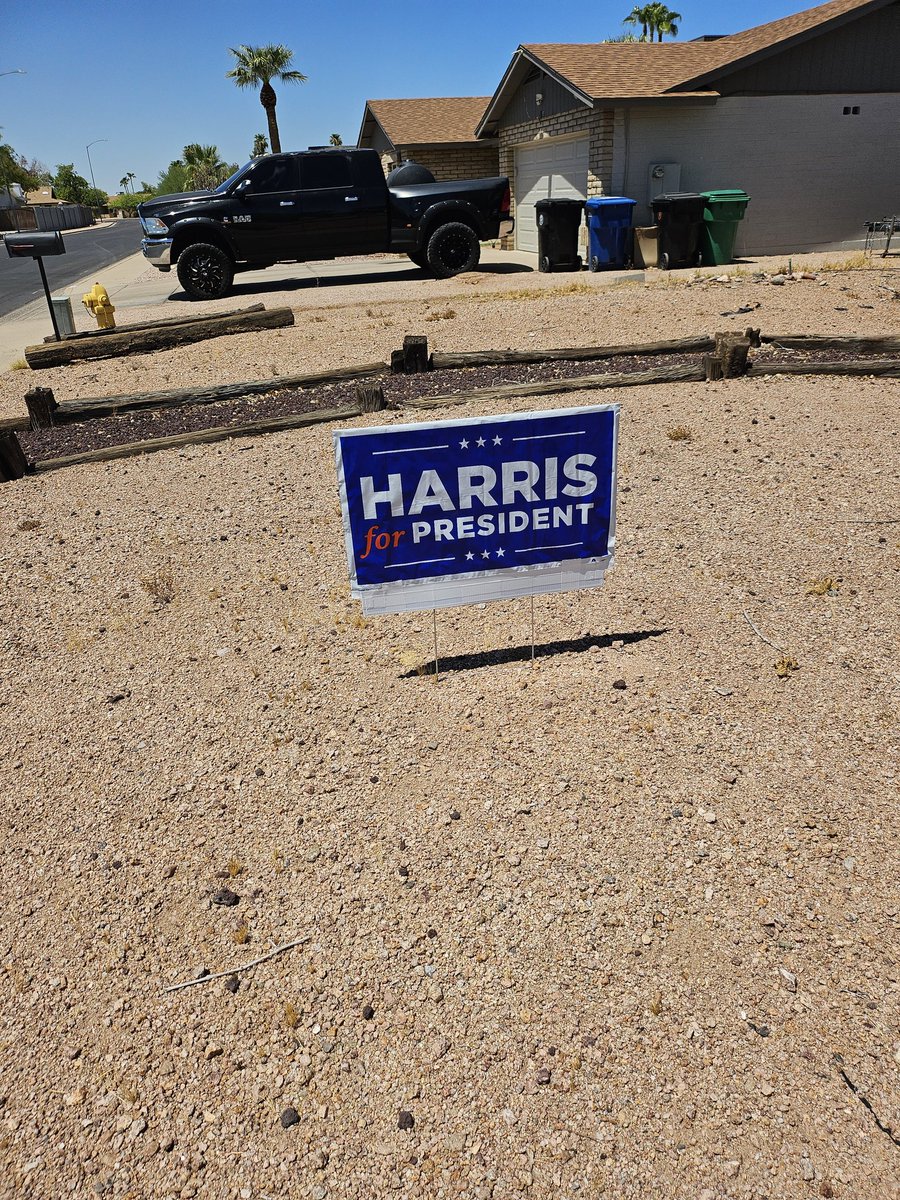 purpleadam4's tweet photo. The sign on the left was originally in our front yard. The sign on the right is what we put up after our Harris sign was stolen. Neighbor also had theirs stolen. To the @realDonaldTrump supporter who stole them, enjoy losing on election day.
#Harris_Walz2024
#GarbagePeople 
#Vote https://t.co/vsHPxEXsYL