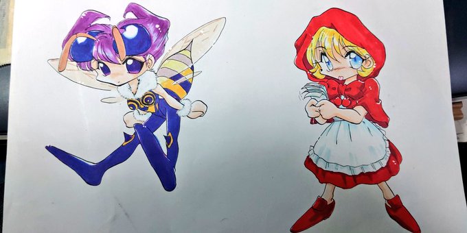 #格ゲーキャラ描こうぜセイバー出たときにラミカバッジ用に描いたキュービーとバレッタ。彩色はコピック。 