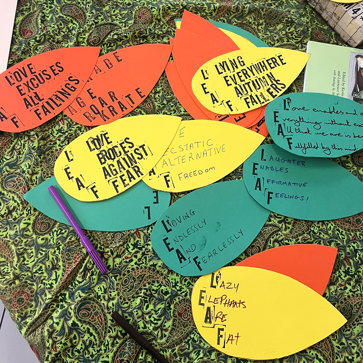 ExeterCathedral's tweet photo. Last week Exeter Cathedral's Riddler in Residence, Jon Seagrave aka Jonny Fluffypunk, held a  drop-in poetry session at Exeter Library featuring a range of fun poetry-themed activities including leaf poems, haiku writing and magnetic poetry. #ExeterCathedral #RiddlerInResidence https://t.co/3UXGiRIN9O