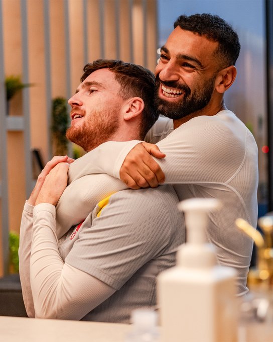 Photography of Andy Robertson and Mo Salah at the AXA Training Centre.