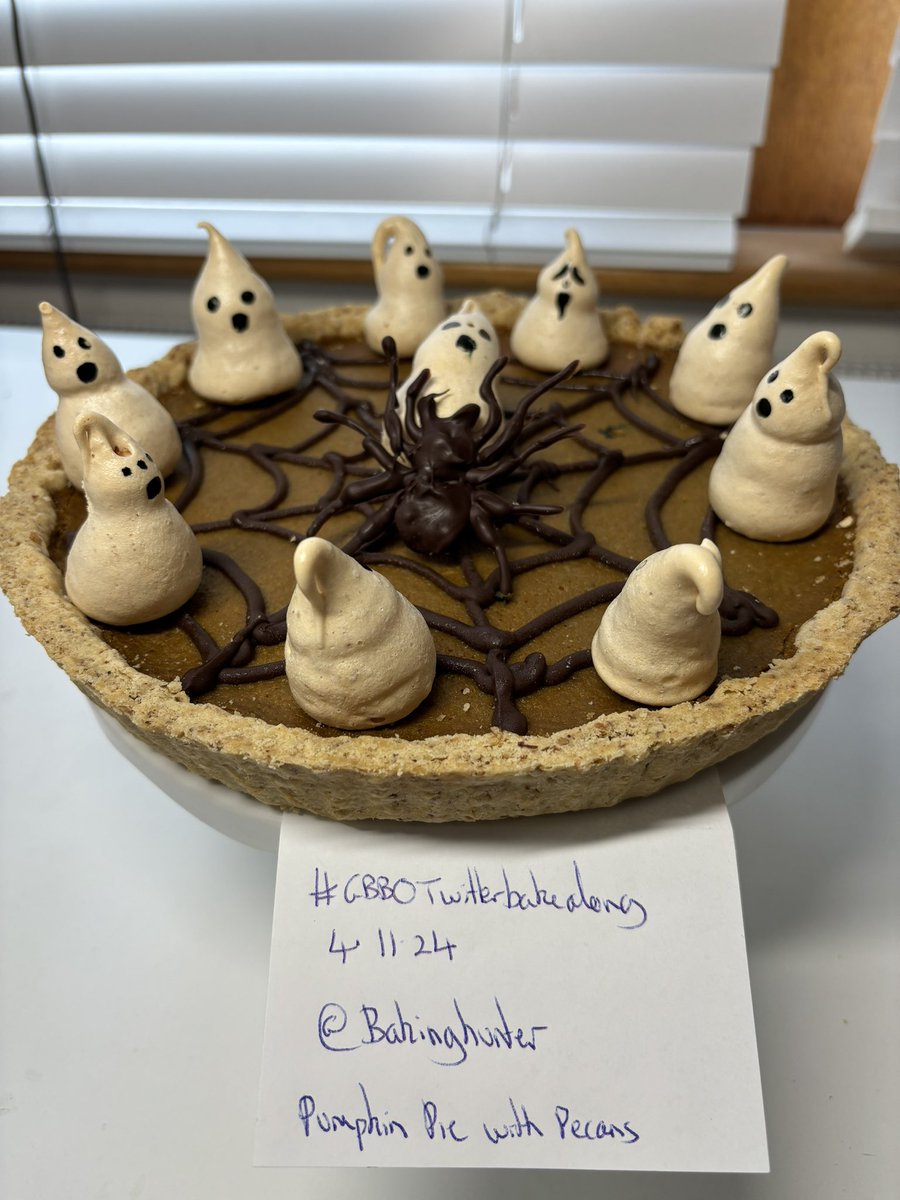 bakinghunter's tweet image. Autumnal Pumpkin pie roasted in maple syrup with pecan pastry with meringue ghosts and menacing spider ! @thebakingnanna1 @Rob_C_Allen @marybethxx6  #GBBO with #nutmeg #blacktreacle #cream #ginger #cinnamon #maple syrup  #pecans #mixed spice #pumpkin #ghostface #screa