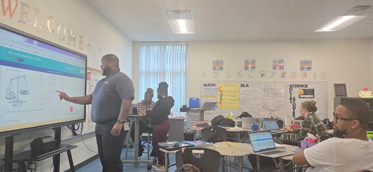 Mr. Wright and IEF brown being active participants in 4th grade collab. Previewing unit assessment to inform instruction! 

What are we doing? What are the expected to do? 

How do we know they have shown mastery?!