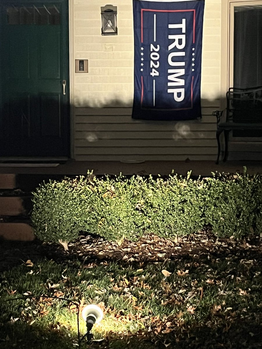 BigFish3000's tweet photo. My sister put up a Trump
Flag and did not know how her husband would take it since he had been against putting out yard signs in the past. 
He added a spot light. https://t.co/9vwXOi1tp1