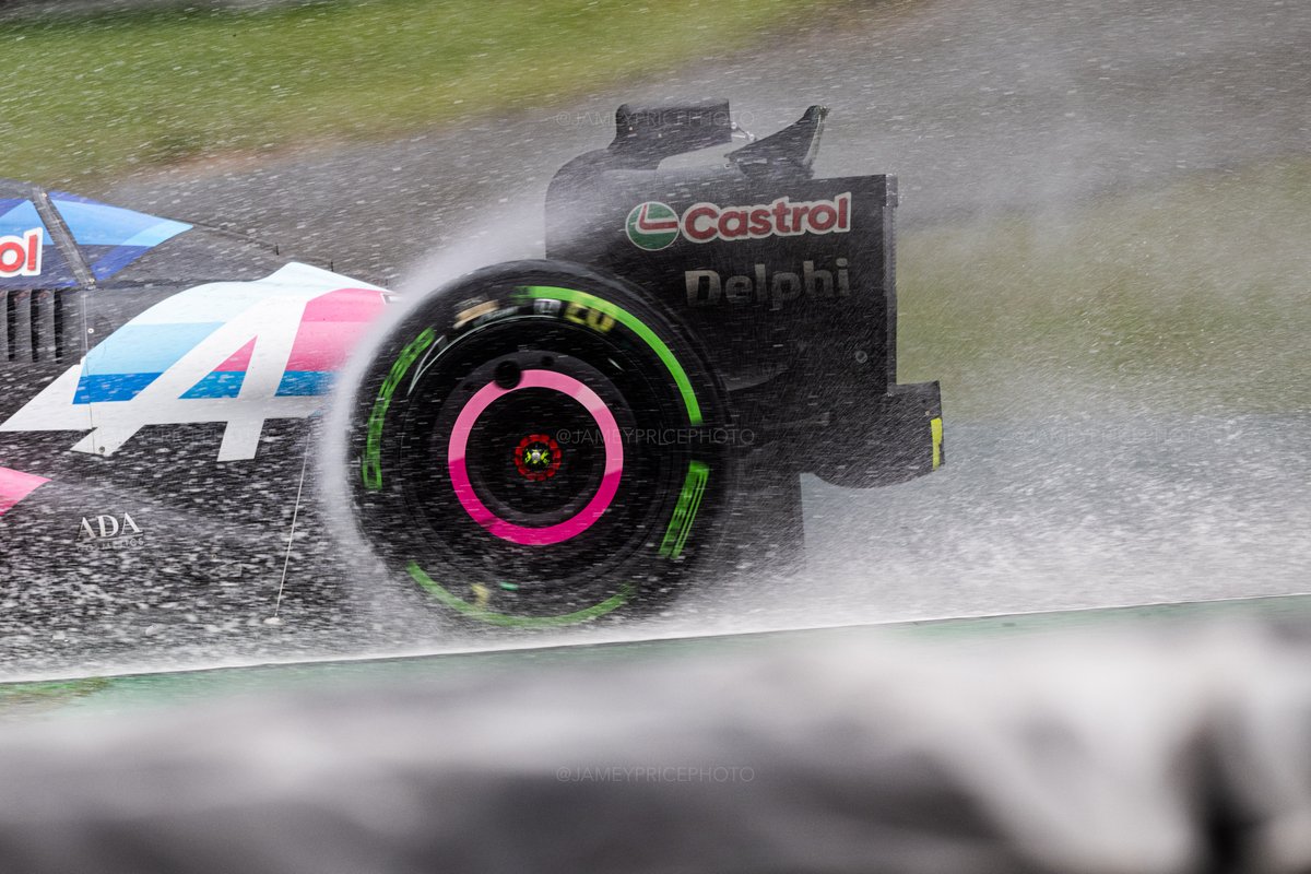 jameypricephoto's tweet photo. Watching the rain flow over the car yesterday, was quite cool. Yeah, we got soaking wet. BUT I love working in the rain when the cars are on track and turning laps. You can capture the cars in ways you would never ever do in dry conditions. #F1 #Formula1 #BrazilGP #Formulaone https://t.co/N1eZ72jc2p