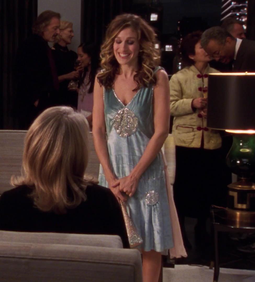 Carrie Bradshaw wearing a beautiful dress from Marc Jacob's Spring 2004,  while attending a horrifically iconic party (or was it iconically  horrific??) in season 6, episode 18 (aptly titled Splat!)