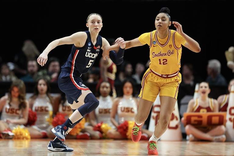 SBJ's tweet photo. As women's college basketball gears up for the season, all eyes are on UConn's Paige Bueckers and USC's JuJu Watkins 🌟🏀

Their compelling stories and dynamic play could define the sport's future and attract new fans as they showcase their talent on the court. https://t.co/cvY2jpqNWZ