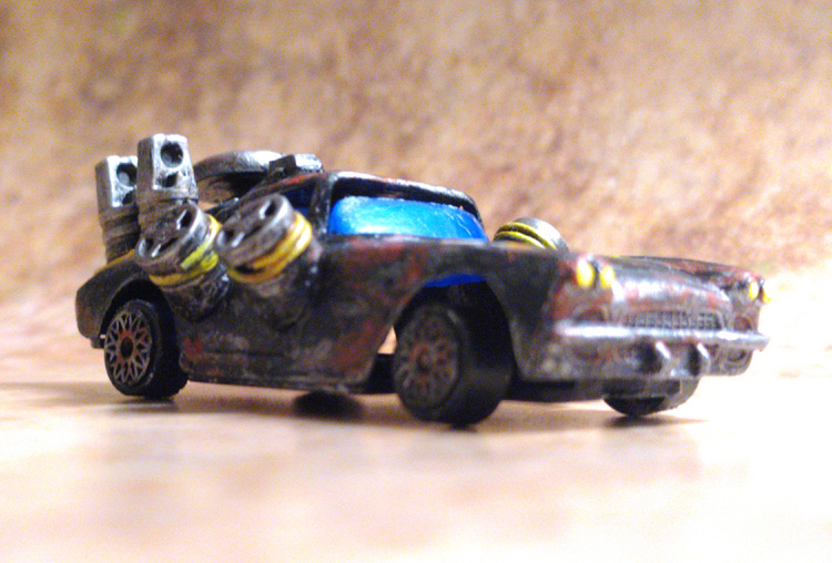 I made another car for Gaslands, a Mad Max-style board game with modified toy cars. This one's called "The Accident" and was made with LEGOs, a broken Switch joycon and wires. The detailing on the hood is the car's original paint - only some rust color was added.
#gaslands