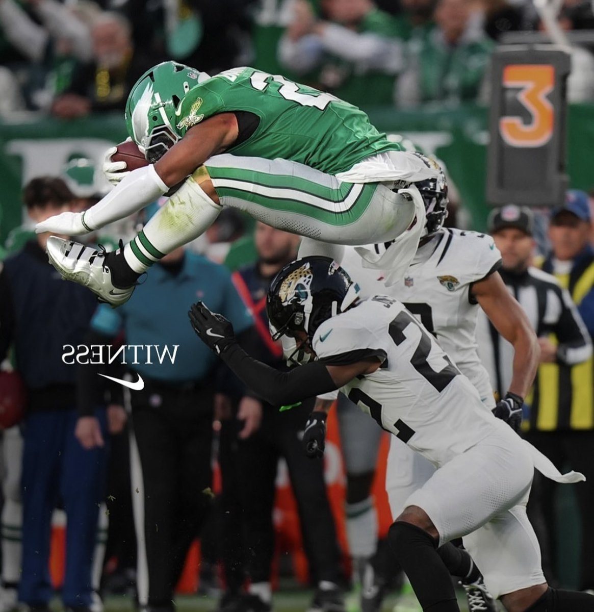 JClarkNBCS's tweet photo. Nike’s new ad for Saquon Barkley is backwards after his incredible reverse hurdle! https://t.co/4dQ5M25Rj8