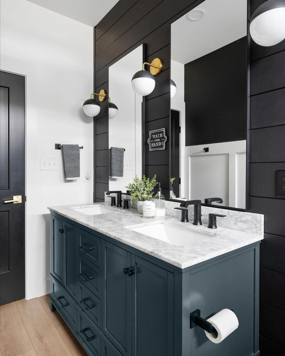 Vanity lighting is crucial in darker-toned bathrooms, ensuring you have the perfect glow for your morning routine. 🖤

Transform your space and elevate your self-care moments with this Wall Sconce by Mitzi now: cur.lt/h3swxb9hc

Design via Chesapeake Charmhouse