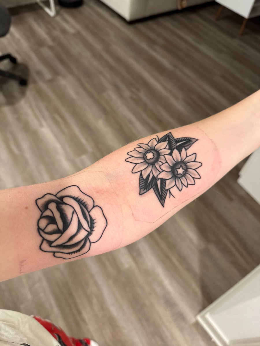 anncatrogers's tweet photo. @awsten @waterparks I got my first ever Waterparks inspired tattoo! The sunflowers are from the Lowkey as Hell mv and I’m sure you can guess what the cross and star in the middle of them are… https://t.co/RECUmjAiMl