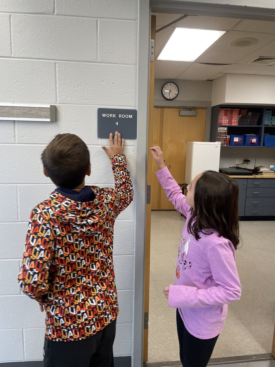 Field trip in our own hallways!  We searched for Braille so we would be better able to understand our text about a boy and his guide dog!