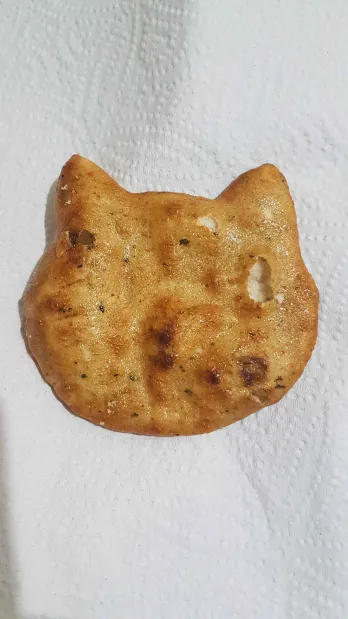 Cat shaped rice cracker. Heh.