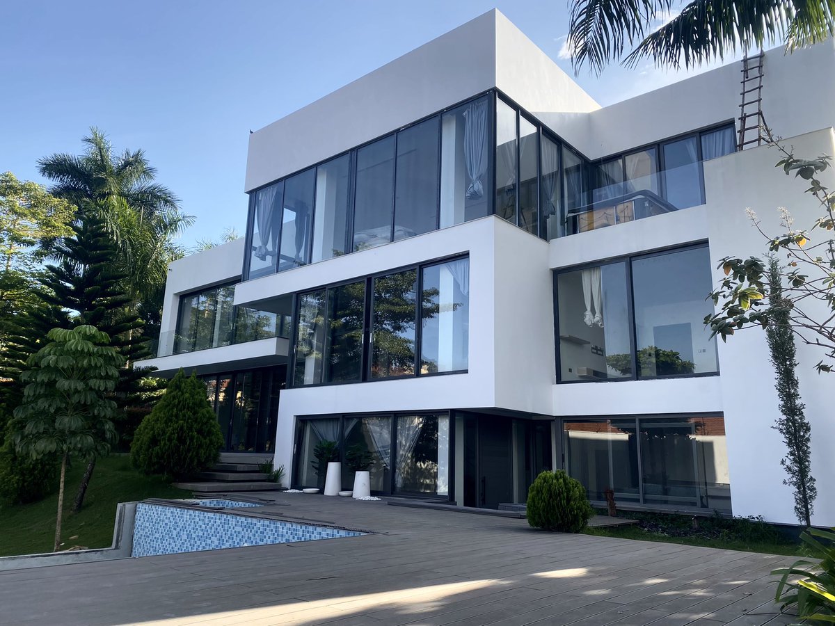 Selling at a whopping $2,500,00 this is where Mlmodern architecture meets tranquility. This stunning home blends spacious design with lush surroundings—crafted for those who value both luxury and privacy.