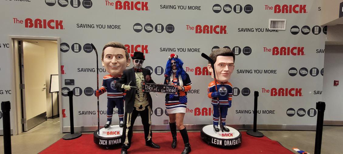 TaraSparshu's tweet photo. When #OilersBabie shows up for Dia De Los Muertos. 

Edmonton Oilers The Brick #brickbestseats #DiaDeLosMuertos https://t.co/9oJ61JRs7t