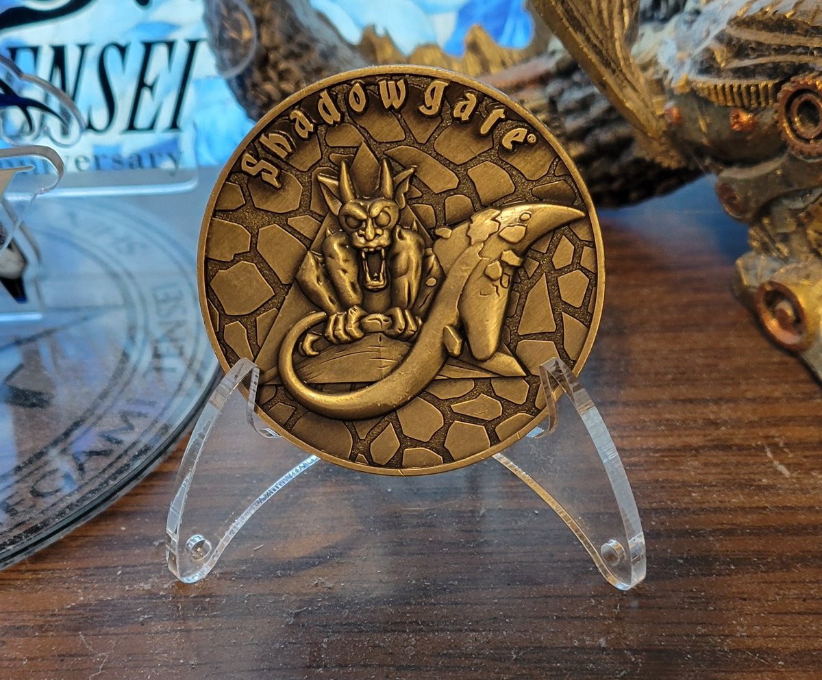PennaFischer's tweet photo. Look what came in the mail today!! My Shadowgate coin!!
It's in good company in my desk. Leaving it facing Death!
@Chrisaegrim #BeyondShadowgate https://t.co/3jSlaoBkK1