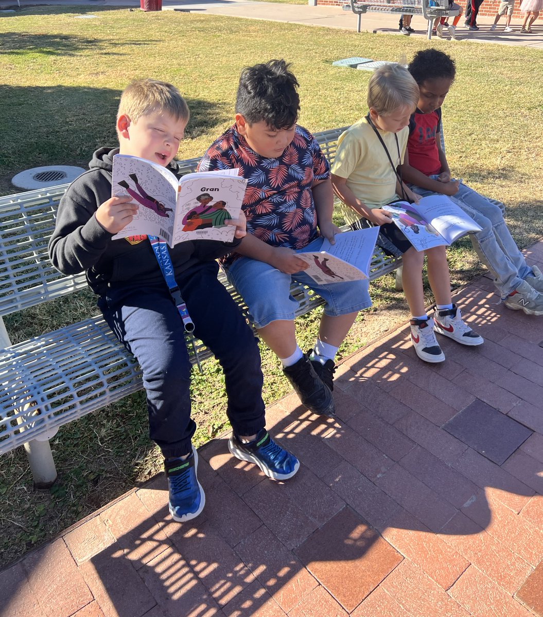 First grade stepping outside to enjoy reading and sunshine!