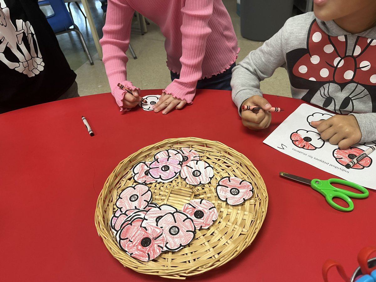 MissMertl's tweet photo. We’re in the midst of poppy colouring for the wreath we are making! Ask your wolf what colour poppies are! https://t.co/S2DDDiAfI8