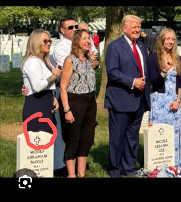 woodeye2u's tweet photo. @DBlack_Mountain Woman on far left in this photo: " I'll just use this soldier's grave stone as a little table for my cell phone because I want to do a 'bullhorn' hand gesture for the photo with Mr. Donnie." https://t.co/mUNV2EluAg