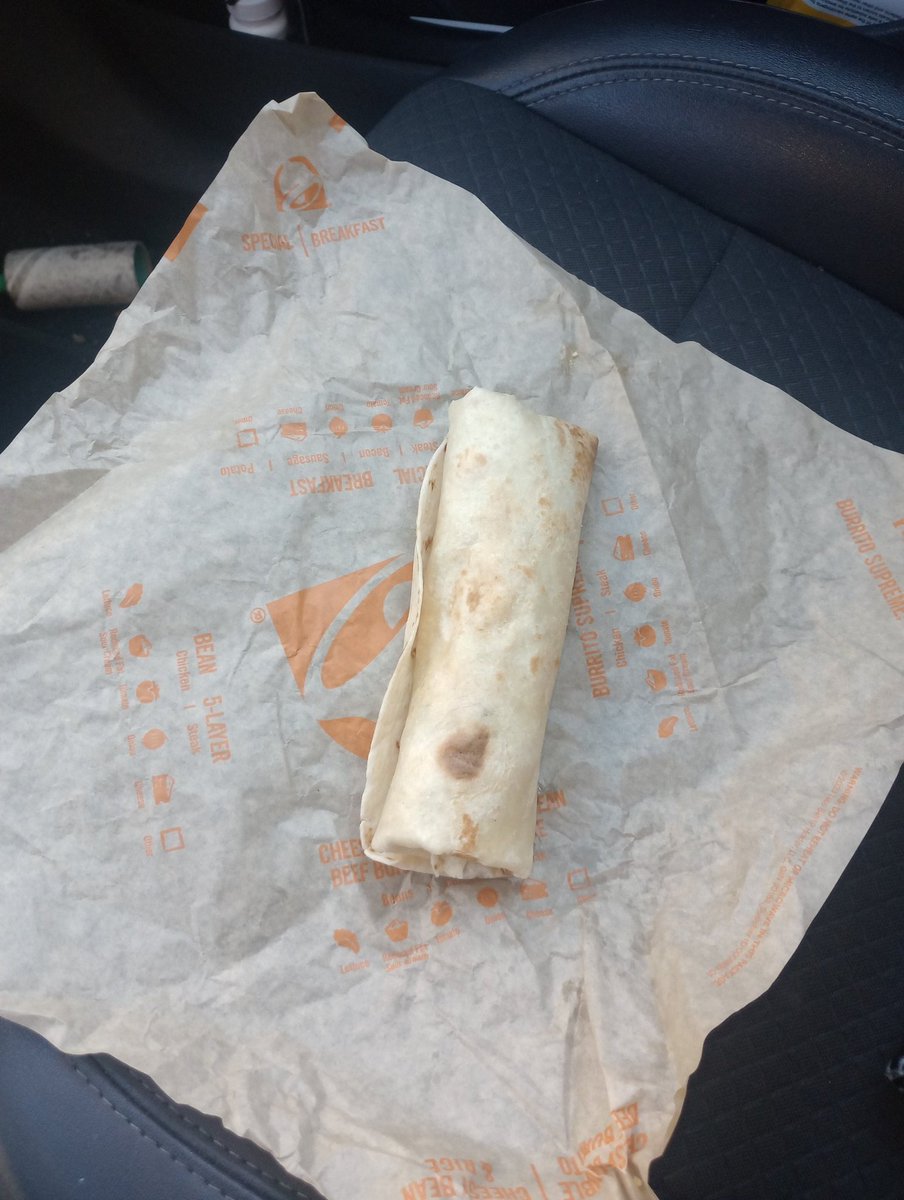 ComicBillStone's tweet photo. @tacobell so I have not been to a Taco Bell in a couple of years, and especially not for breakfast. I was in a hurry this morning and decided that I would stop there and grab something. I see a picture for a cheesy toasted breakfast "burrito". And this is what they gave me!!! SAD https://t.co/dOJbKaFZaH