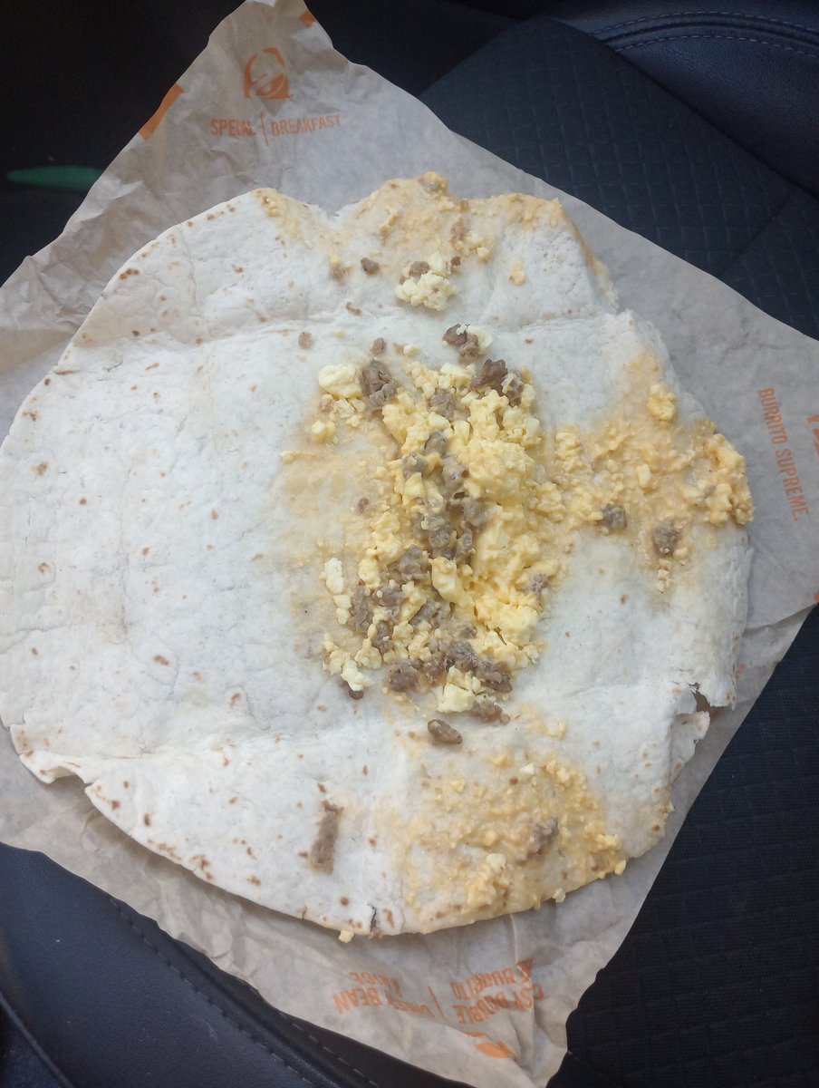 ComicBillStone's tweet photo. I mean they're definitely a 100% cheating you on their portion sizes! I see more filling at the end of that burrito in the picture then there was in the entire burrito when I opened it.... Do better @tacobell https://t.co/LE9GlVTIAQ
