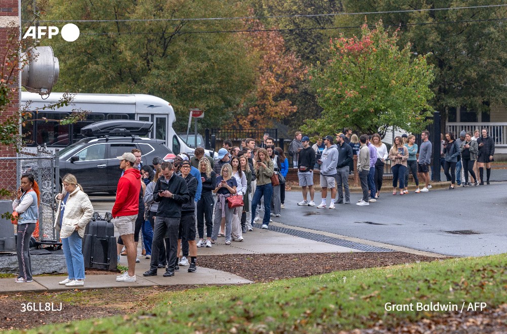 People wait in line to vote outside a polling station at Greater Galilee Baptist Church in Charlotte, North Carolina, on Election Day, November 5, 2024