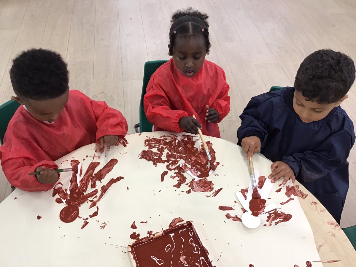 Getting messy as we paint Gingerbread men! <a href="/st_patricks/">St Patricks Primary</a>