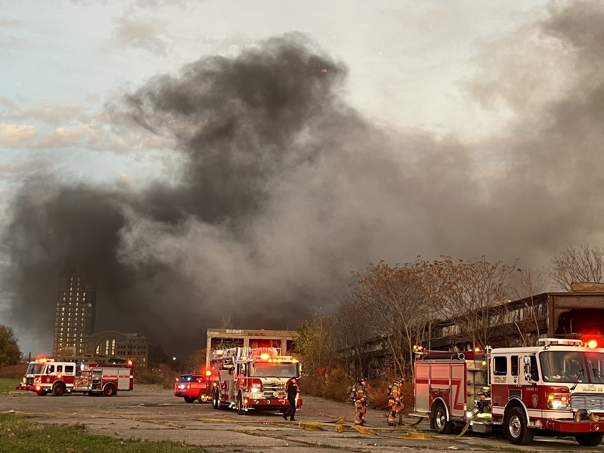 ByPatrickLakamp's tweet photo. Firefighters dousing a small fire with a lot of smoke on Central Terminal property. No structure looks involved. https://t.co/UDcvfvZ59E