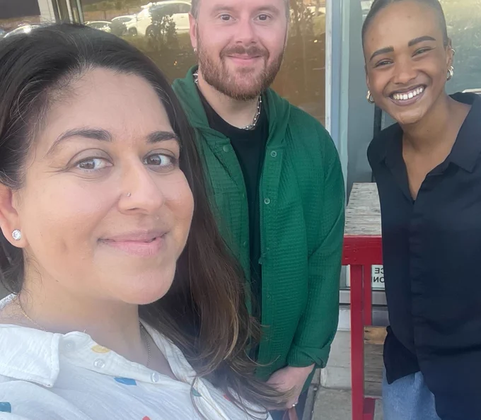 auticon's three neuroinclusion coaches smile for a selfie