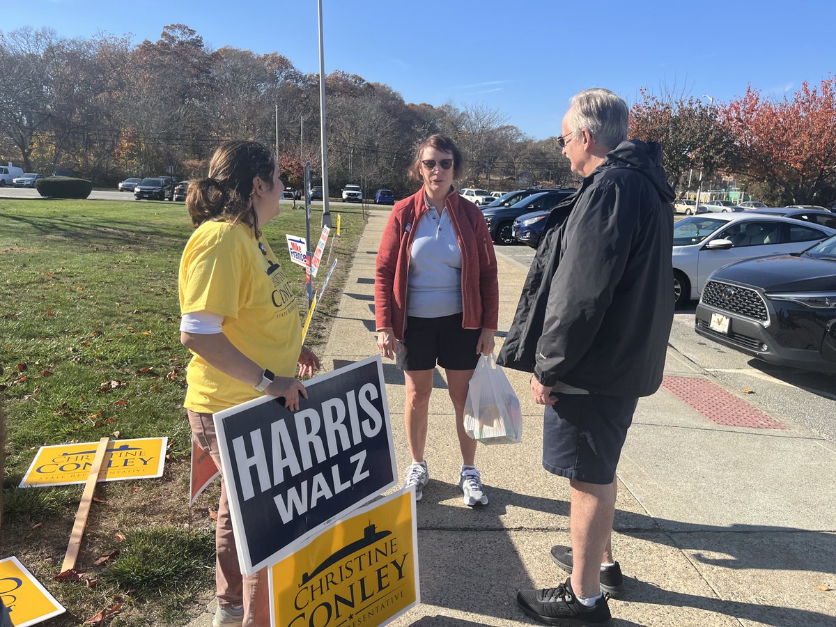 State Rep. Christine Conley, D-Groton, who is running for re-election to the 40th district, talks with Groton voters Patti and Dennis Pearce. Dennis said he voted “Democratic all the way,” because he feels democracy is at stake.