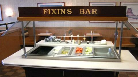 If you are in line for the fixins bar you have accidentally warped to 1993 and you are at Roy Rogers. I have no idea what you should do but enjoy the roast beef.