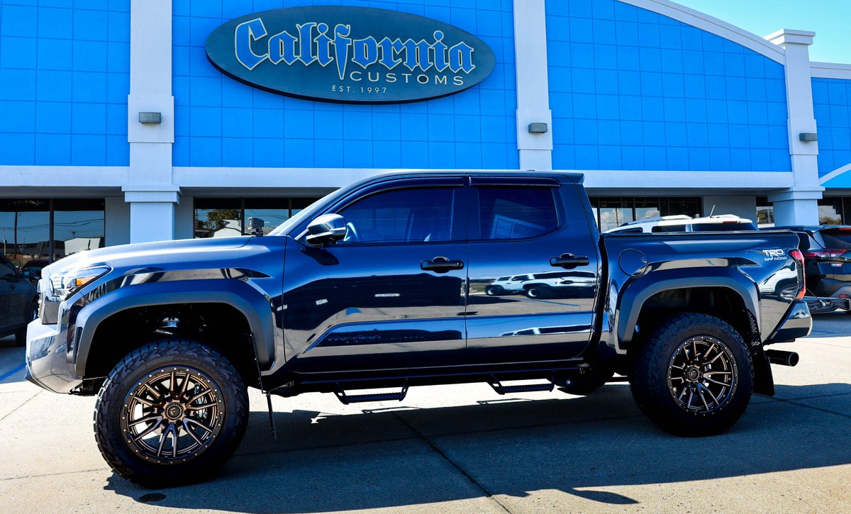 calcustomsfs's tweet photo. Lifted and loaded! This Tacoma stands taller with a 3” lift, rugged Field Rebel wheels, and Nitto Recon Grappler https://t.co/5yz0CR0QP4's built to handle rough terrain with style and strength!

#liftedtrucks #liftkit #liftedtacomas #trailready #BuiltForAdventure #OffRoad https://t.co/aUpMw5Mr3x