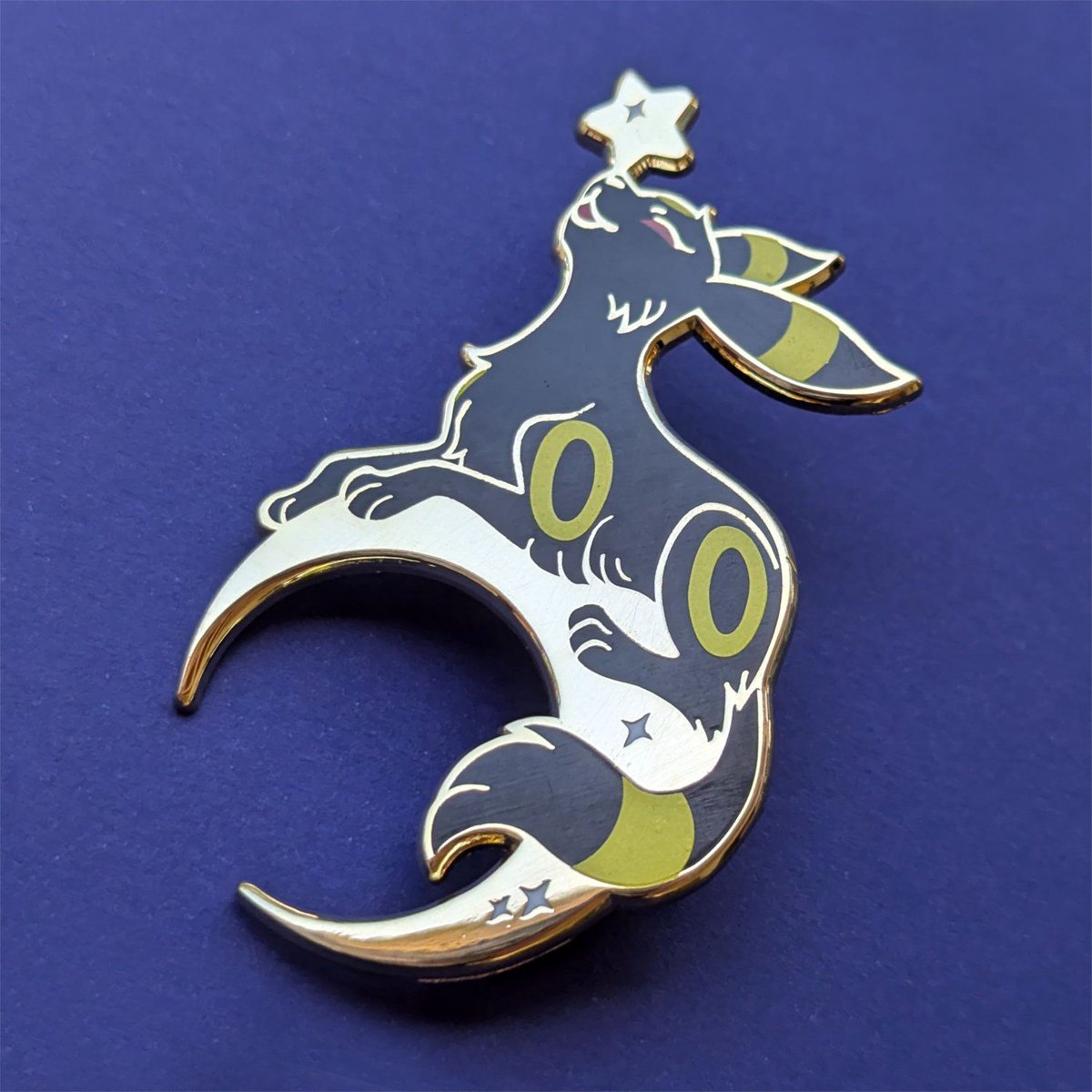 mamathzilla's tweet photo. I've been working on a massive massive shop update - including this umbreon pin that many people asked for! 

I love the blue metal and already want to make soooo many more coloured chrome pins. https://t.co/crgZEF7mmw