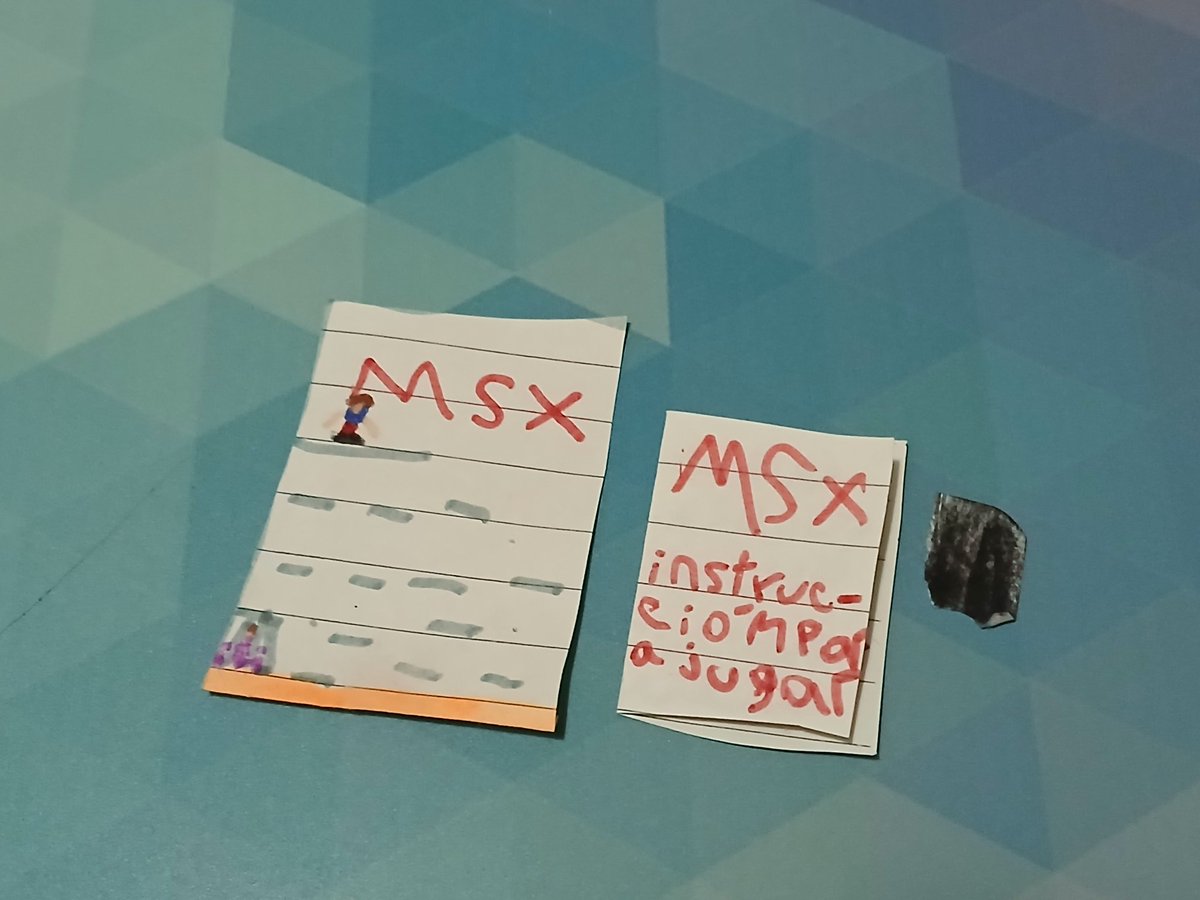 nanochess's tweet image. My daughter says that I like so much MSX computers, that she made me an MSX game with box, manual, and cartridge 😀 #retro #retrogaming #msx