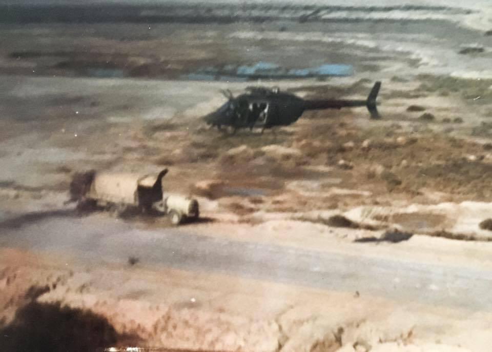 FPWellman's tweet photo. It’s hard to see me. You have to zoom in. I’m the 22-year Army officer and combat veteran flying that scout helicopter over the final battle of Desert Storm. It was my first of four combat tours. I voted for Kamala and Tim Walz because I’ve seen what happens in fascist countries. https://t.co/SQt7O5oK2Y