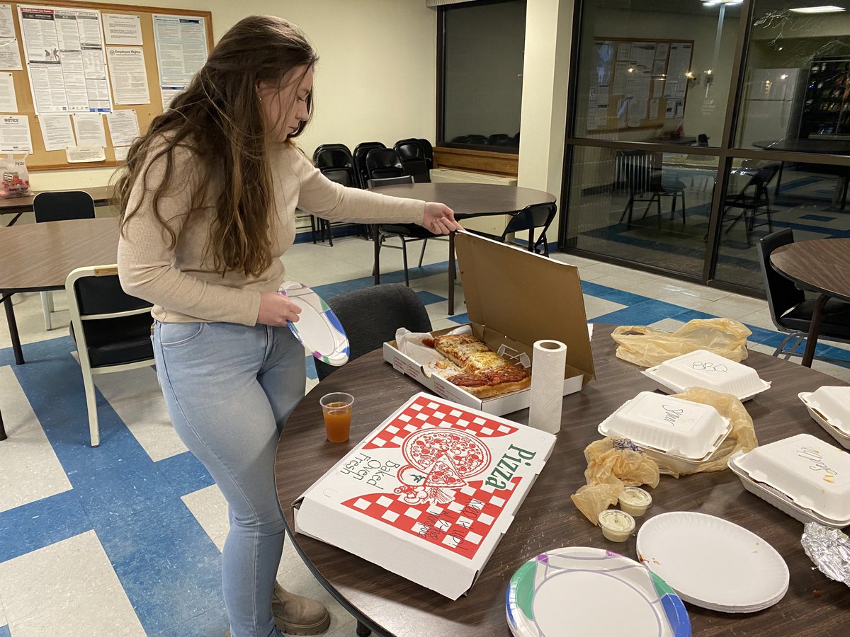 jlotemplio's tweet image. P-R staffer Carly Newton indulging in the traditional Election Night pizza and wings. Thank you Monopole!