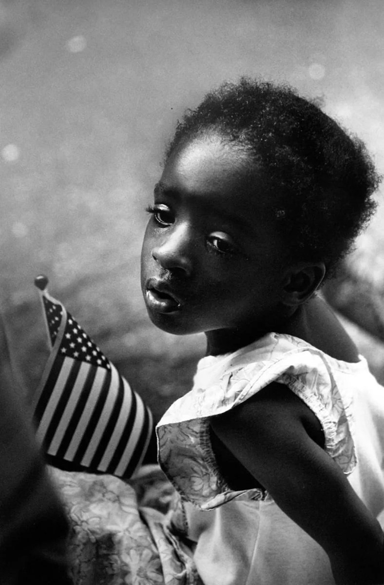 . 

@ Earlie Hudnall                  Girl with Flag

.