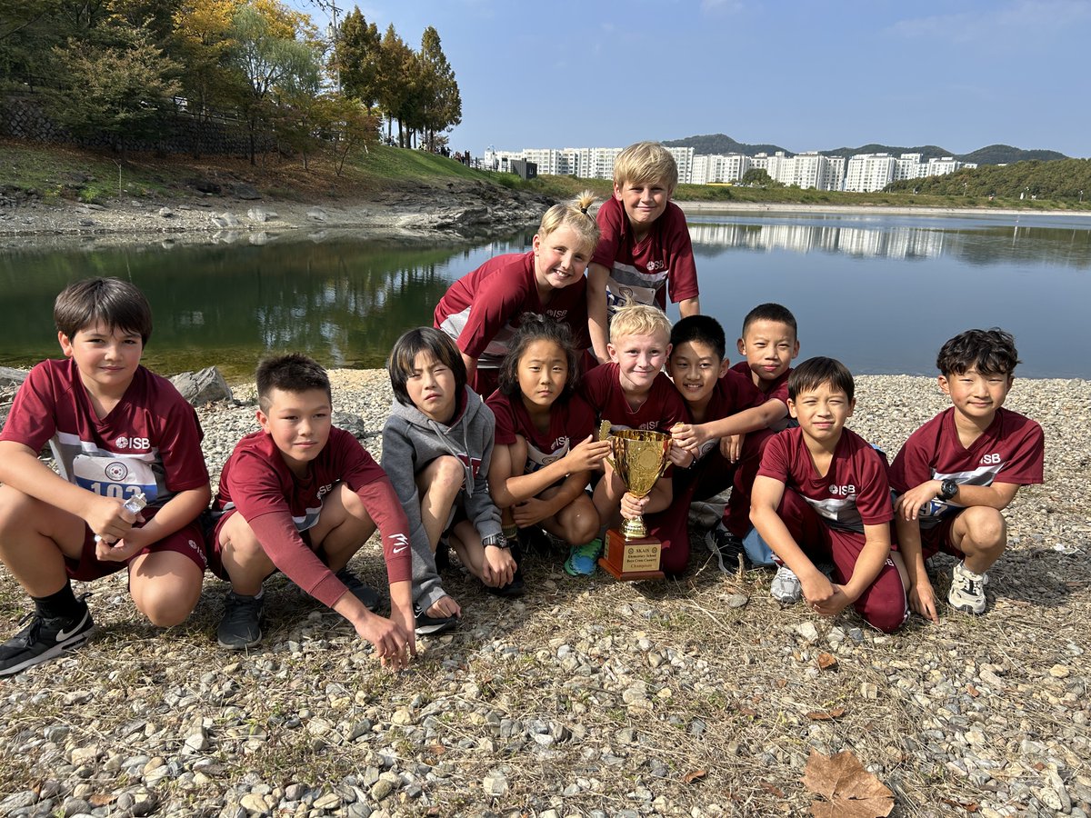 ISBLearning's tweet photo. Congratulations to our ES X-country team for a fantastic performance at the #SKAIS finals. We were very proud to see all of our athletes encouraging each other! The elementary boys team won the championship, so we're delighted to bring the trophy back to #ISB. #ISBLearning https://t.co/NMpgWrQZmf
