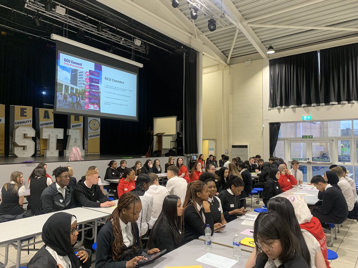 StMargaretSTA's tweet photo. S5 pupils meeting the students of Glasgow Caledonian University! Thank you to @GCUConnected for all the information on courses and pathways 🛣️ Well done S5 for your engagement and excellent behaviour ⭐️@MrsFarrellDHT @StThomasAqSec #wideningaccess #positivedestination https://t.co/iOFWN64hpO