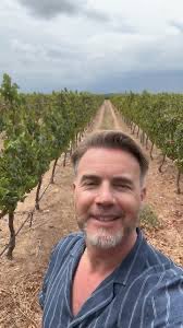 Gary Barlow taking a short rest in his son’s scalp after helping him dye his hair green